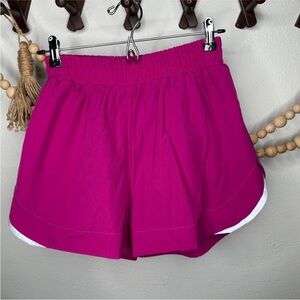 Alphalete Stride Fuchsia Athletic Shorts